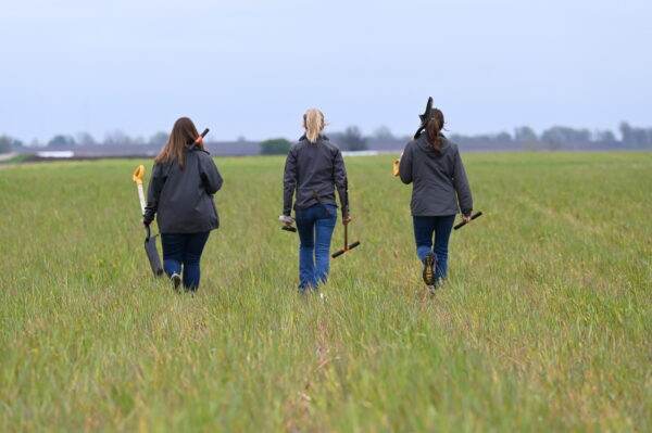 agronomy team walking in field